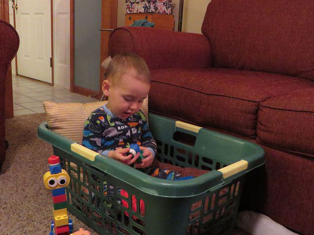 Pillow and Duplo fun in a basket