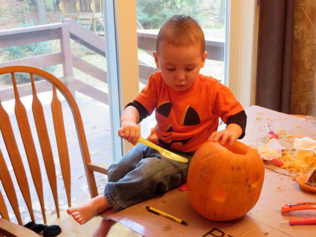 Trying out his carving skills