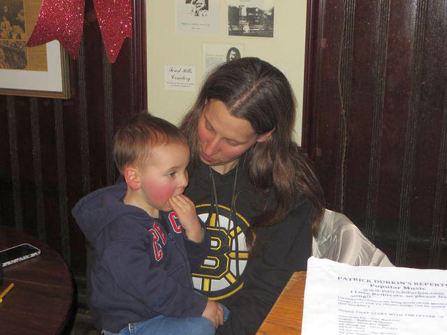 Rosy cheeked piano player watcher