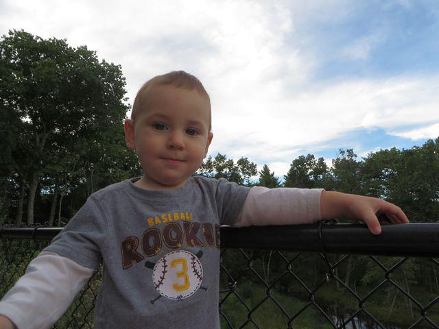 Waiting for cars to go under the bridge