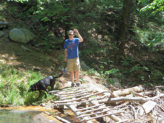 Sean and Loki by a beaver dam