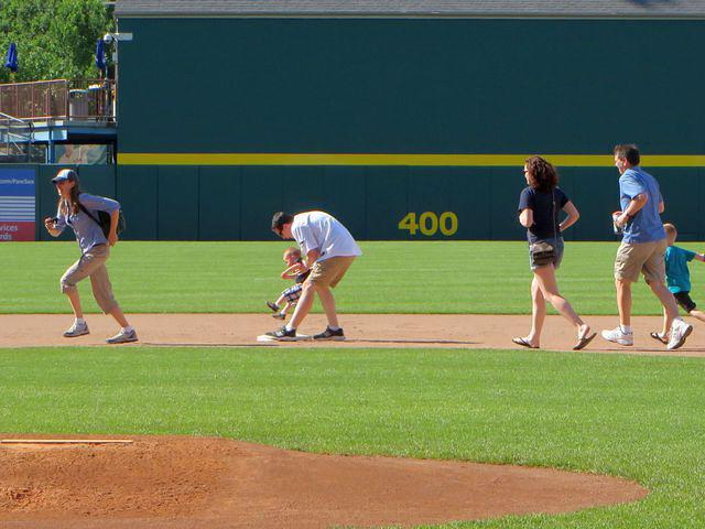 Sean helping Thomas hit the base