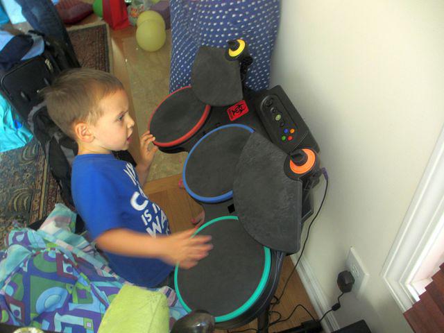 Singing and Drumming to Dirty Deeds Done Dirt Cheap by AC/DC