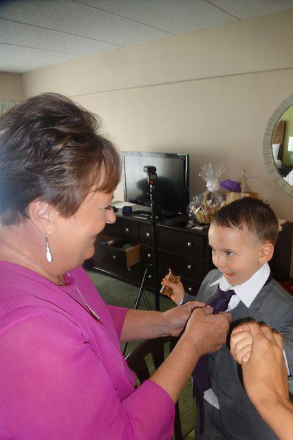 Grandma Fixing Little Mans Tie