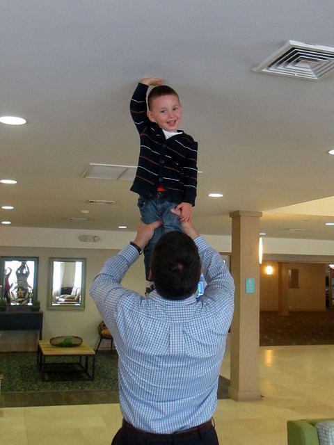 Touching the ceiling with Grandpa