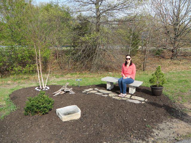 Meg sitting in one of the gardens along the way