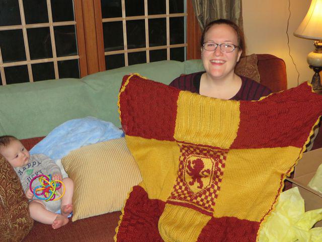 Isaac and Mommy admiring Gryffindor Afghan