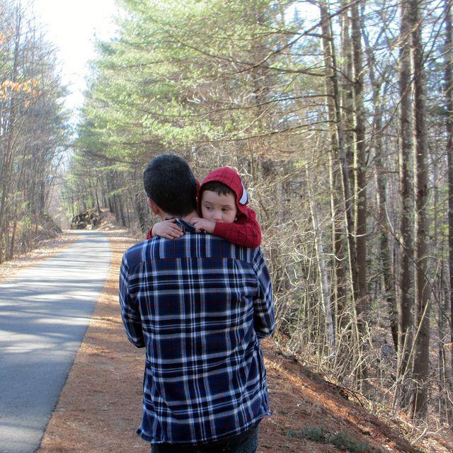 Tired boy heading home