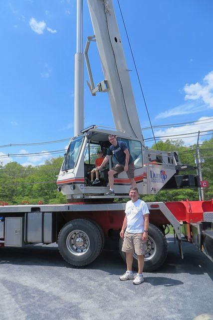 Three Boys and a Crane