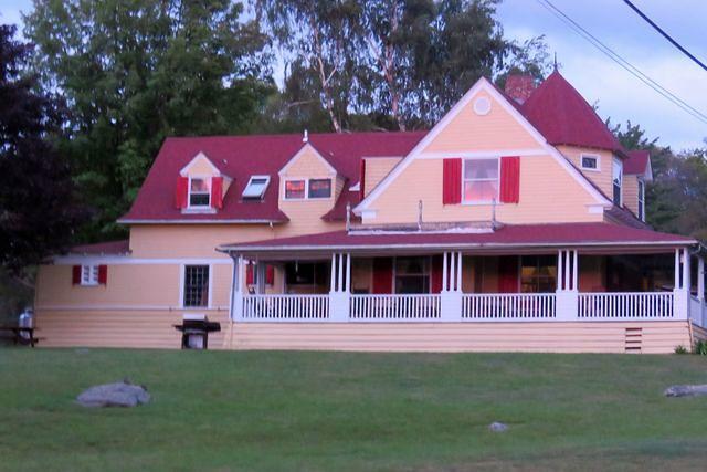 Sunset Reflected in the Windows of Redwood Lodge