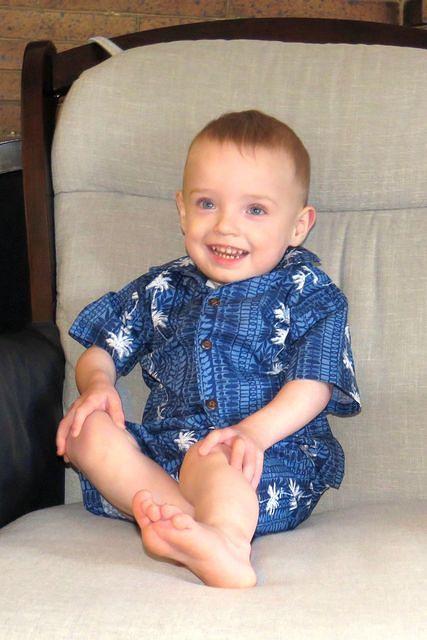 Modeling His Hawaiian Outfit