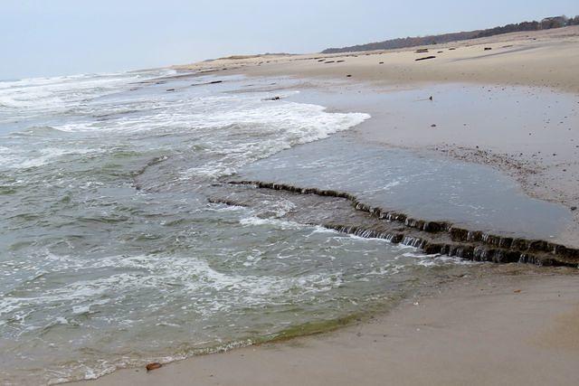 Waves Carving the Beach