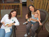 Meghan, Beth and Thomas enjoying dinner on the roof deck
