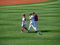 Joe Kelly and Christian Vazquez heading for the dugout