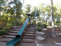 Beth and Thomas climbing up to the tunnel slide