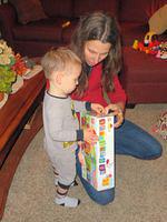 Momma helping Thomas open
