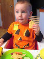 Paid for pumpkin enjoying football snacks