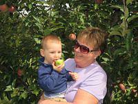 Showing Grandma how to eat an apple