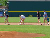 Sean helping Thomas hit the base