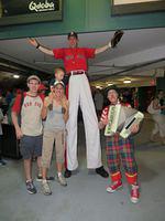 Thomas more worried about the clown than the huge guy behind him