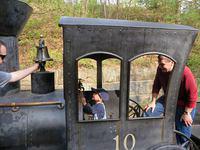 Showing Grandpa how to ring the bell