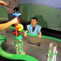 Enjoying Mommy's Water Fun