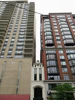 Nestled Amid The Tall Buildings