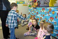 Handing Out Rhythm Sticks