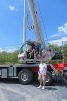 Three Boys and a Crane