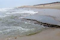 Waves Carving the Beach